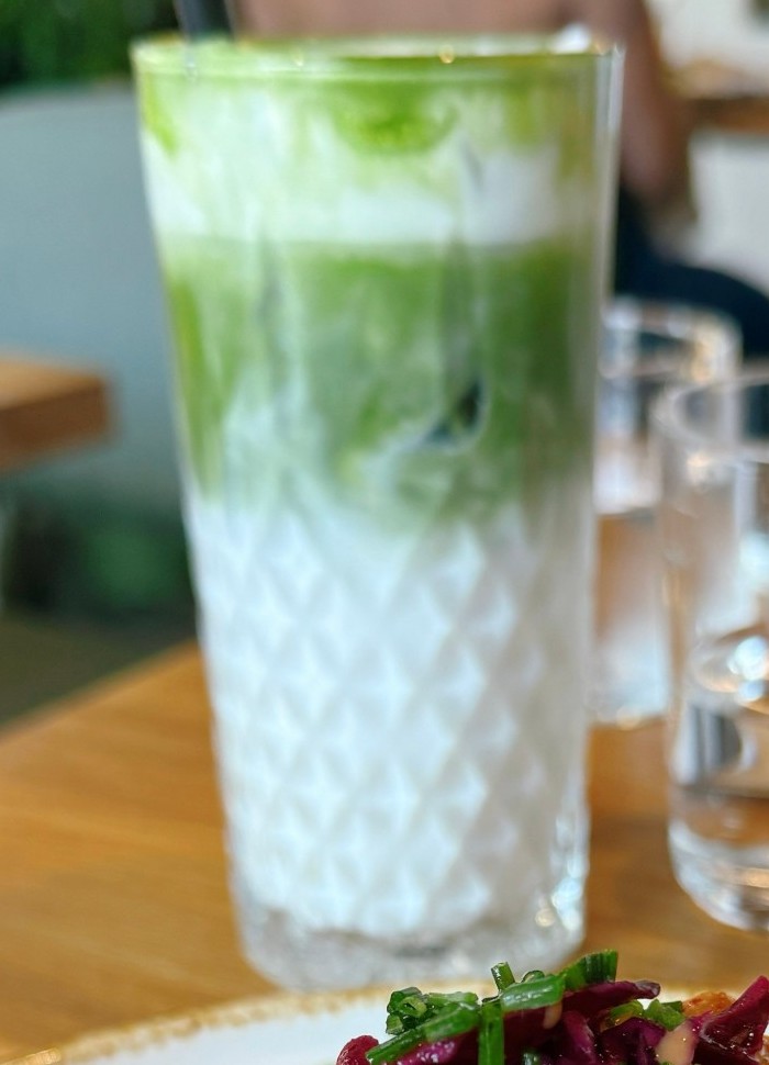 FYSA iced matcha latte in a tall glass