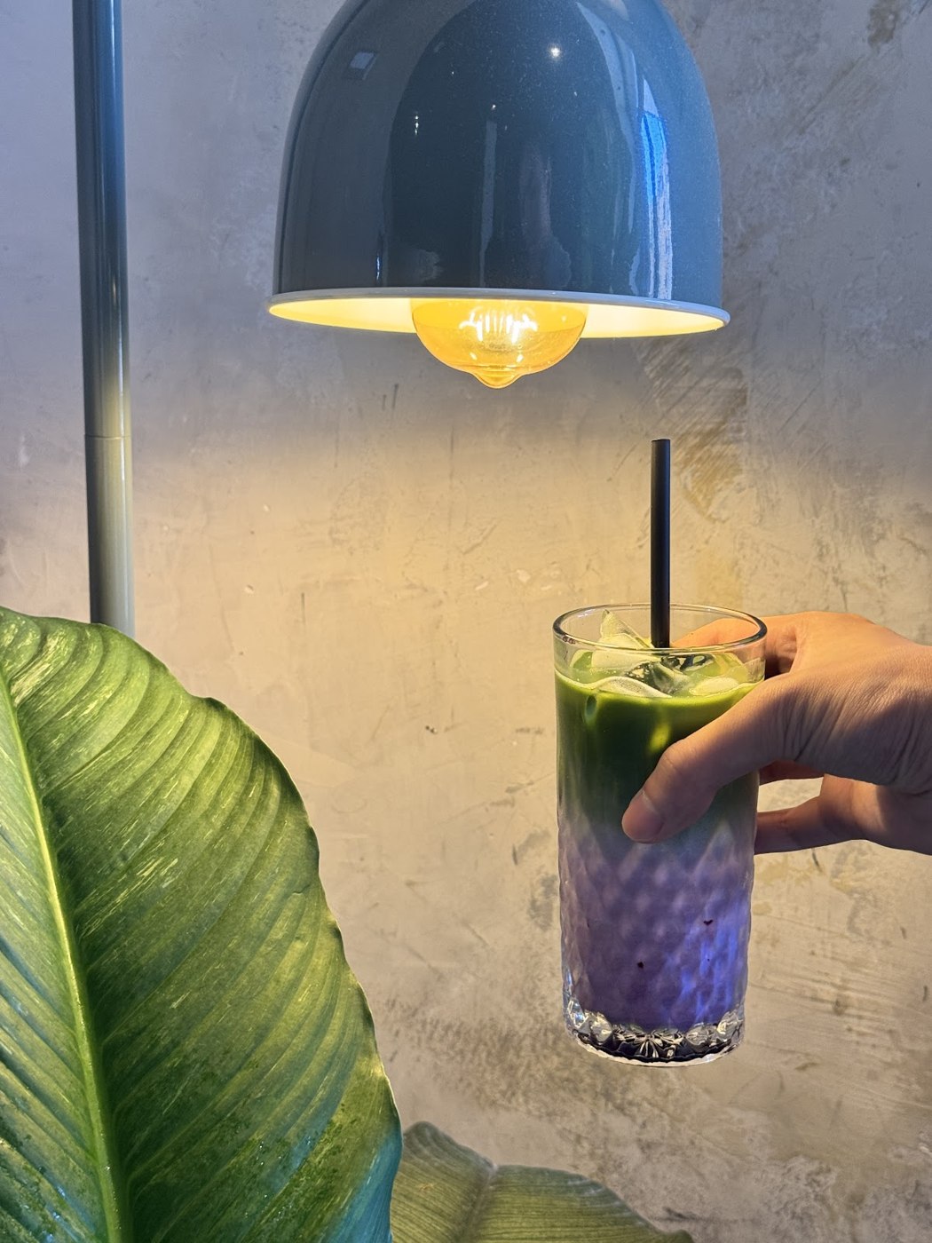 FYSA's ube matcha — purple and green layers in the glass, one of our signature drinks